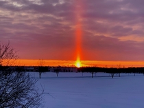Sun pillar formed by ice crystals in the atmosphere in Wisconsin earlier tonight