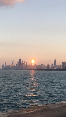 Sun reflecting on glass tower in Chicago 