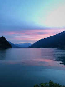 Sun setting over lake Brienz as seen from Iseltwald Switzerland 