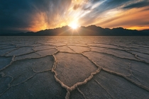 Sun setting over the lowest point in North America in Death Valley National Park California 