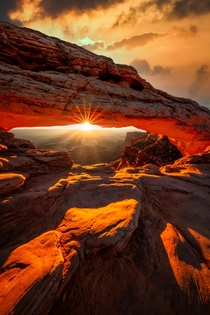 Sunrise at the iconic Mesa Arch in Canyonlands National Park Moab UT  IG jmkevisuals