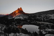 Sunset at Upper Cathedral Lake and Cathedral Peak in Yosemite National Park 