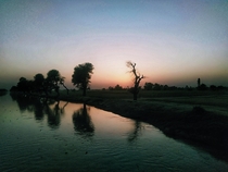 Sunset on canal bank in a village in South Punjab Pakistan 