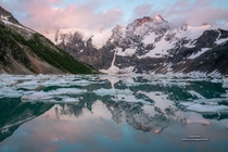 Sunset over Lake of the Hanging Glacier in the Purcell Mountains of BC  