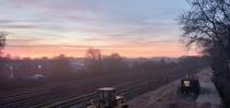 Sunset over train tracks Chichester