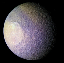 Tethys - April   Saturns moon Tethys is seen in this colorized uncalibrated view from Cassini on April   Expanded spectrum colors using infrared green and ultraviolet Credit NASAJPLSpace Science Institute Processed by Kevin M Gill