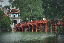 Th Hc Bridge literal meaning is Welcoming Morning Sunlight Bridge Vietnam First built in  destroyed by fire amp rebuilt in 