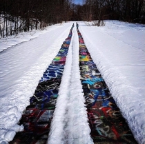 The abandoned graffiti-covered highway in Pennsylvania with snow by novusstreetart 