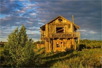 The abandoned house in an abandoned village of prisoners Sovza in the north of Russian which can be reached only on a special train for the special pass