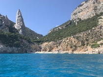 The blue Mediterranean meets ragged rocks in Cala Goloritze Sardinia 