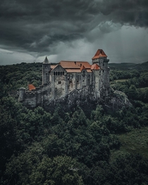 The Castle of Fzr built in the th century sits  meters above sea level among the hills of Zempln Mountains in Hungary