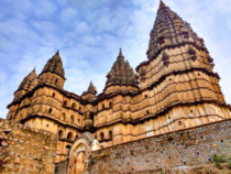 The Chaturbhuj Temple in Orchha INDIA dates back to th century and is known for its unique tall spires Vimana in the shape of pine cones that reaches up to  ft in height