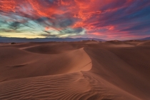 The crawling sand dunes of Death Valley with the sky ablaze Photo by David Thompson 
