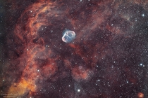 The Crescent Nebula NGC  swims through glowing hydrogen gas About midway between the Crescent and the bottom of the image is the much fainter Soap Bubble Nebula Credit Nicolas Kizilian from Auffargis France