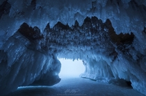 The Crystal Maw - Inside Wisconsins Lake Superior Ice Caves  - Photo by Alex Noriega