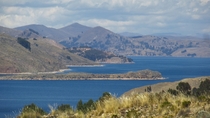 The deep blue waters of Lake Titicaca Bolivia 