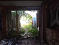 the entrance of an abandoned restaurant i found on the side of the road