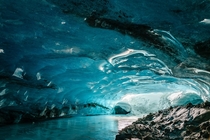 The fleeting beauty of a glacial cave at the foot of the Athabasca Glacier in Alberta Canada 