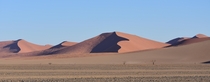 The flowing sand dunes in Sossusvlei Namibia - x 