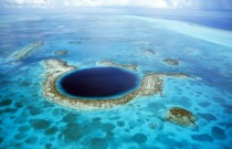 The Great Blue Hole in Belize - A large submarine sinkhole which is over  feet across and  feet deep 