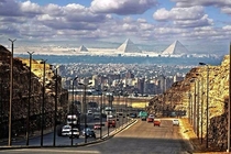 The Great Egyptian Pyramids as Viewed from the Streets of Cairo