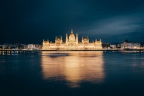 The Hungarian Parliament Building and its golden reflection in the Danube  Photographed by Simon Alexander