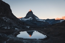 The illuminated Matterhorn Peak on an early Swiss morning 