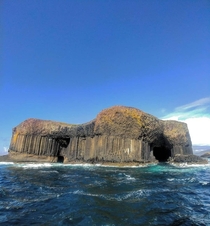 The Isle of Staffa with its naturally formed caves just off the coast of Scotland 