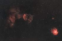 The Jellyfish and Monkey Head nebulae shot under a full moon