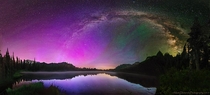 The Milky Way during aurora borealis above Mount Rainier National Park