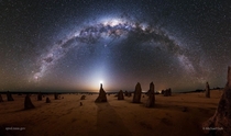 The Milky Way sparkling behind the Pinnacles a group of limestone rock formations in Nambung National Park in Western Australia Just amazing Image Michael Goh