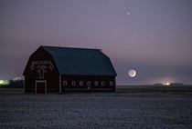 The Moon setting below Jupiter and Saturn across the Manitoba Prairies