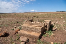 The receding waterline from the Australian drought reveals the step of an old building that was once flooded by the artificially made Lake Burrendong