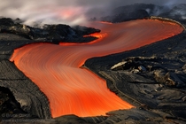 The Red Road - a river of molten rock flowing near Kalapana Hawaii  photo by Bruce Omori