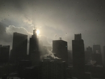 The Sears Tower right now its both sunny and blizzarding