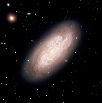 The starburst spiral galaxy NGC  