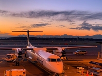 The sun sets over the Olympics at SeaTac airport