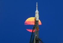 The supermoon rises behind the Soyuz MS- spacecraft at the Baikonur cosmodrome in Kazakhstan being readied for its launch to the International Space Station   
