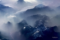 The Swiss Alps from  feet  photo by Goran Jordanski
