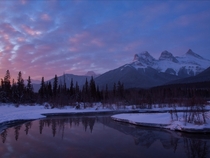 The Three Sisters at sunrise in Canmore Alberta 