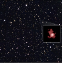 The zoomed in red object is a galaxy known as GN-z It is the most oldest galaxy we know that exists and is approximately  billion years old