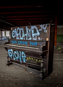 There is always a piano in abandoned places At least  places I visit This was in a church gathering area