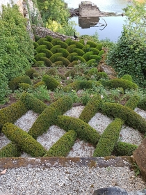 These bushes cut to perfection in a garden of a castle