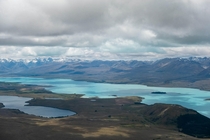 These Clouds are Blue Lake Tekapo New Zealand 
