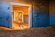 This abandoned home floored with sand in Kolmanskop Namibia