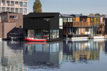 This home floats in a self-sufficient Amsterdam neighborhood
