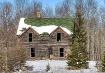 This house has actually been abandoned for a very long time somehow it has survived the winters of Michigans Upper Peninsula