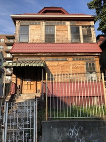 This house in Queens NY- I love how much effort was put into boarding it up in such organized fashion