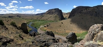 This is also Oregon The Eastern Oregon high desert Three Forks on the Owyhee canyon  miles from Idaho  miles from Nevada and a  mile drive to the nearest paved road For scale the white dot on the left side of the river is my pickup truck 