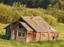 This old log house by the side of Highway  TCH British Columbia